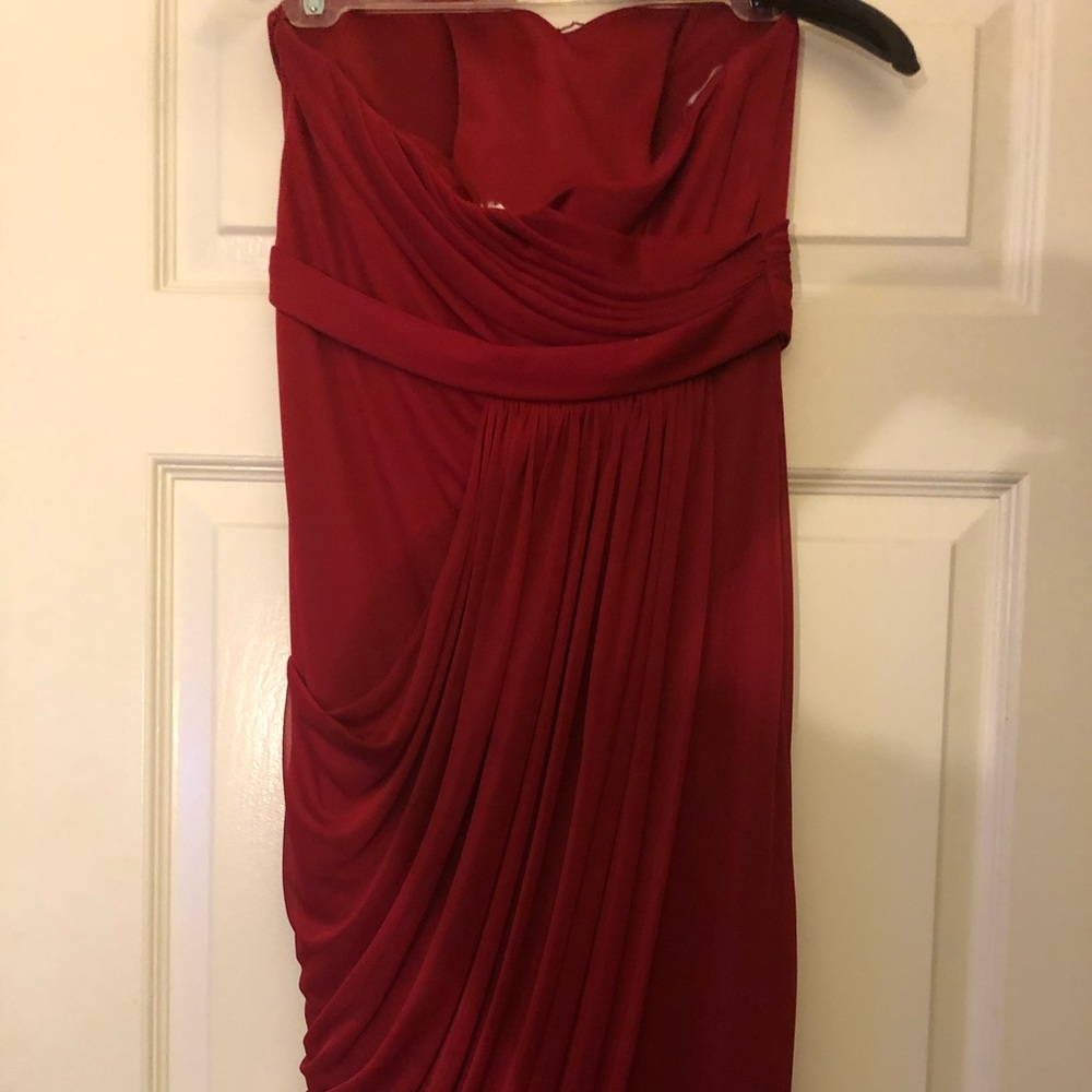 Formal floor length red dress.